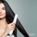 lady using a flat iron: tourmaline flat iron vs ceramic flat iron